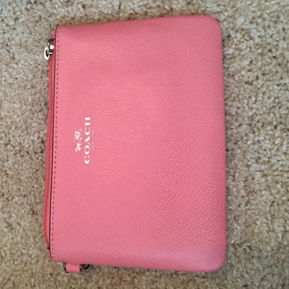 Light pink coach leather wristlet