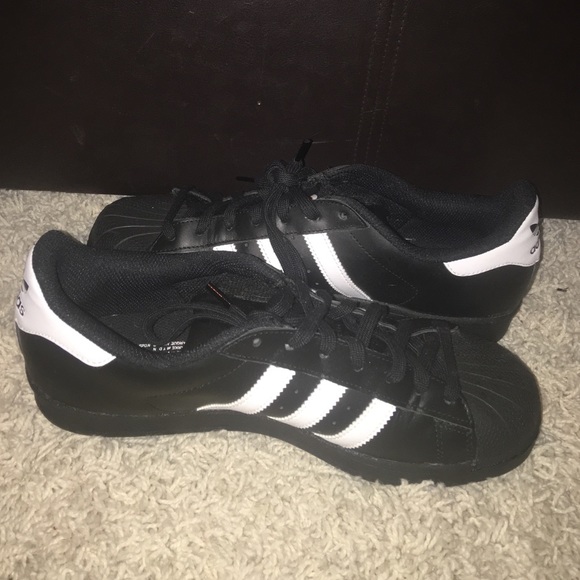 Black Adidas superstar sneakers