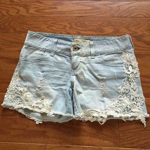 Guess distressed lace and denim shorts