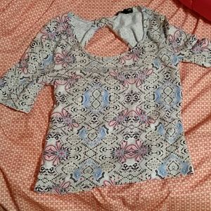 Patterned longer crop top with open back