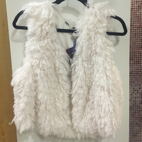 White fluffy fur vest