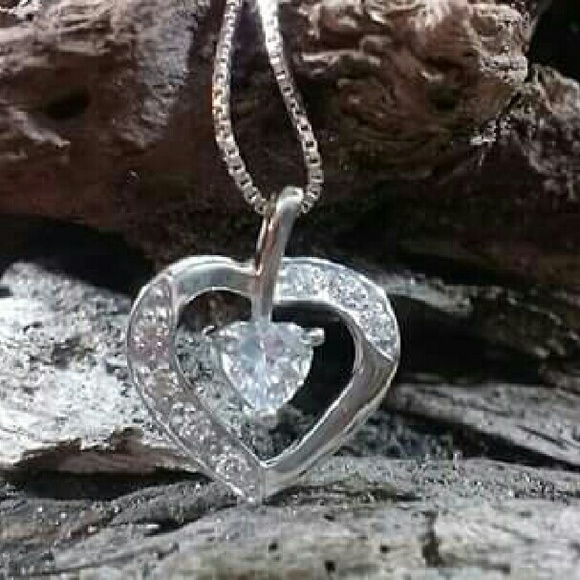 Charming sterling silver heart with chain 16in