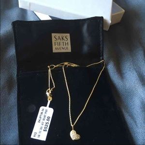 NWT 14k gold heart necklace.
