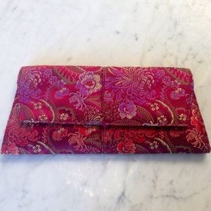 Dark pink floral embroidered clutch. Gently used