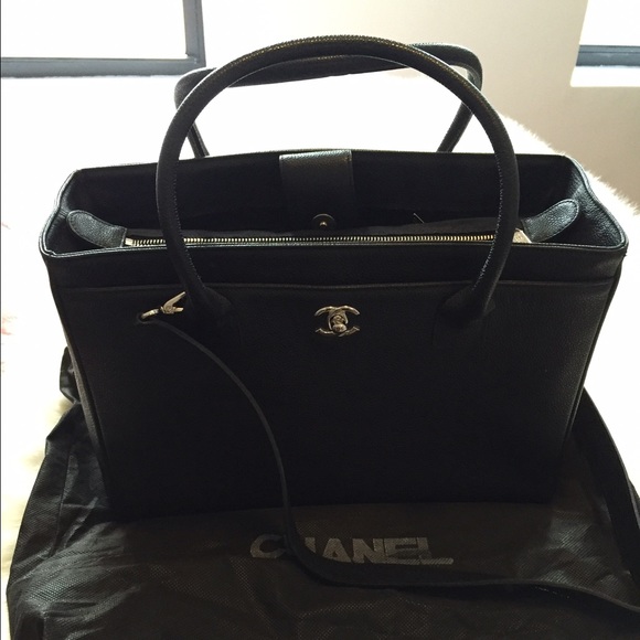 Black leather Chanel bag with cross body strap