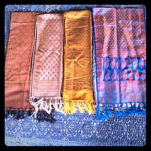 Stunning silk/wool stoles with hand tied tassels.