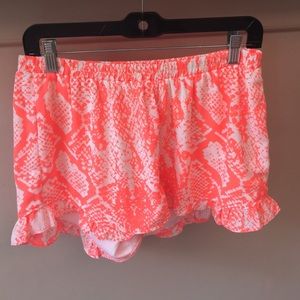Neon orange Python print shorts