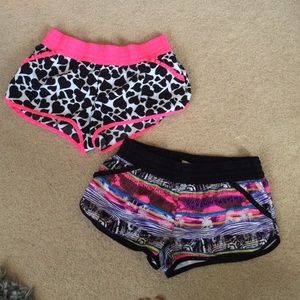 Two pairs of patterned swim shorts