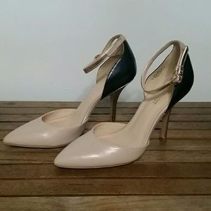 Three toned, ankle strap heels.