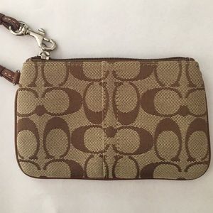 NEW never used classic Coach wristlet
