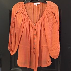 Orange blouse with button detail
