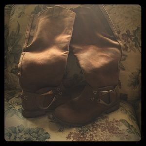 Knee high, brown suede boots.