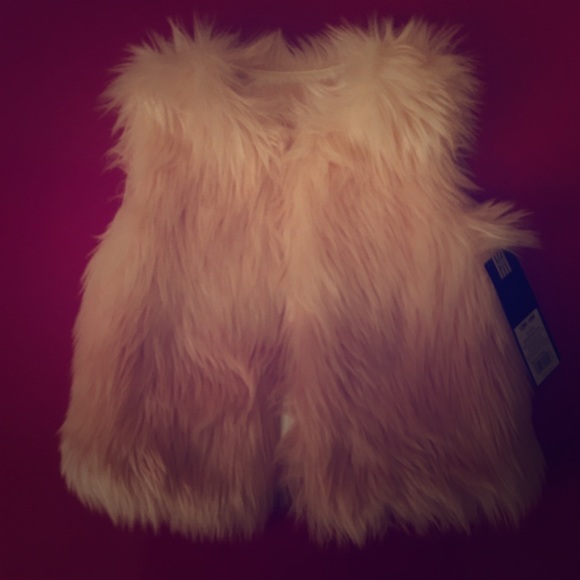 Brand new fury vest with original tags, beautiful