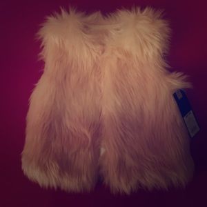 Brand new fury vest with original tags, beautiful