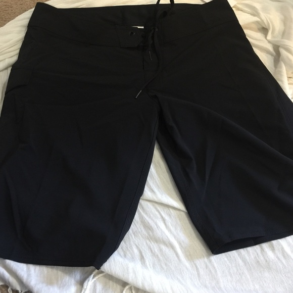 Black board shorts