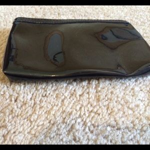 This is a little cosmetic bag it's all black.