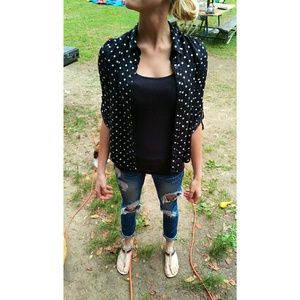 Black shirt with while polka dots