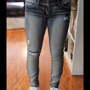 Gray distressed skinny jeans
