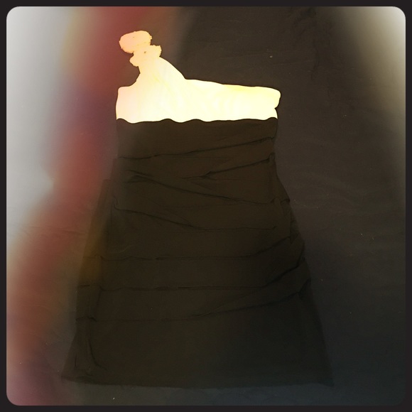 Black and white one shoulder dress.