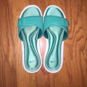 Turquoise Nike Slip-ons