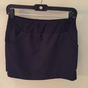 Black Mondetta Tennis/Golf skirt. 15 inches long.