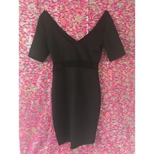 Black party dress with sheer, mesh cutout