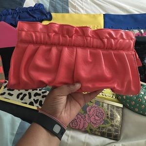 Coral colored Express clutch