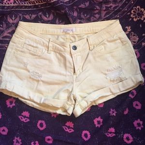 Yellow denim shorts