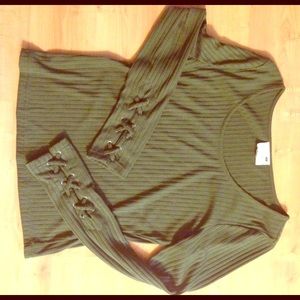 Long sleeve green top.