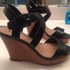 Black size 7 wedges.