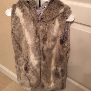 Fur vest with hood and pockets