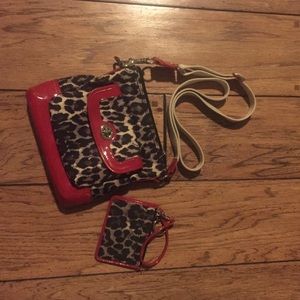 Red cheetah coach purse and matching wallet