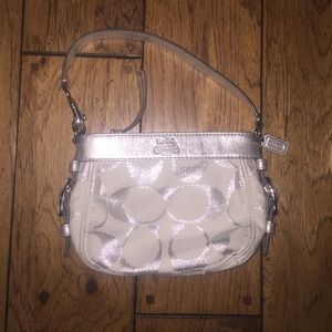 Silver coach purse