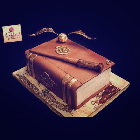 A Harry Potter wand and spell book