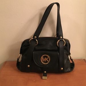 Michael Kors black and gold over the shoulder bag
