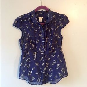 Anthro Blue and white flowered blouse.