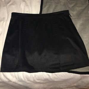 Short black suede skirt