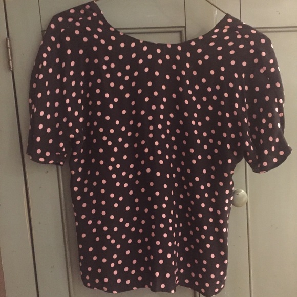 Black silk shirt with light pink polka dots.
