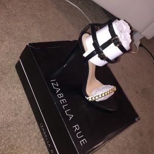 Izabella rue black strappy heels.