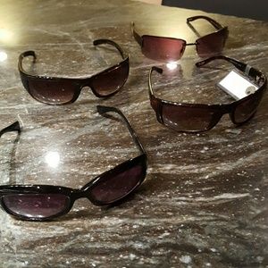 4 pair of sunglasses. Armani Exchange. Perry Ellis