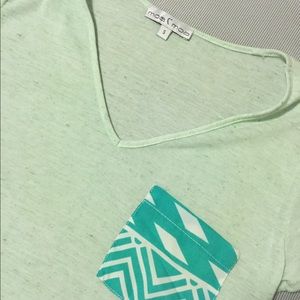 Blue vneck with tribal pocket