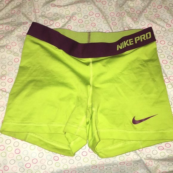 Neon yellow Nike compression spandex shorts