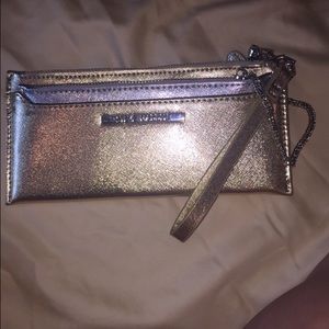 Gold and silver Steve madden clutch/wallet.