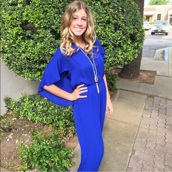 Blue wing back romper. So cute!! Size medium