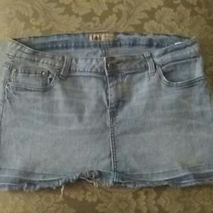 On hold Jean mini skirt lei sz 13 stretch