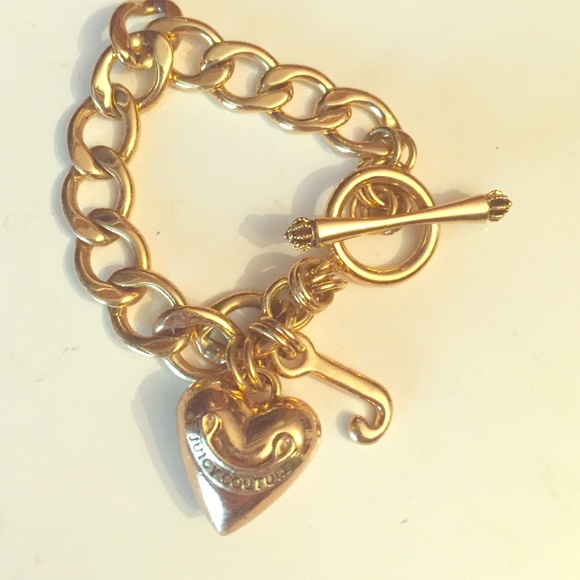 Brand new gold juicy couture charm bracelet
