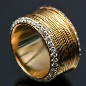1.5 tcw round diamonds in 18k wrapped wire ring