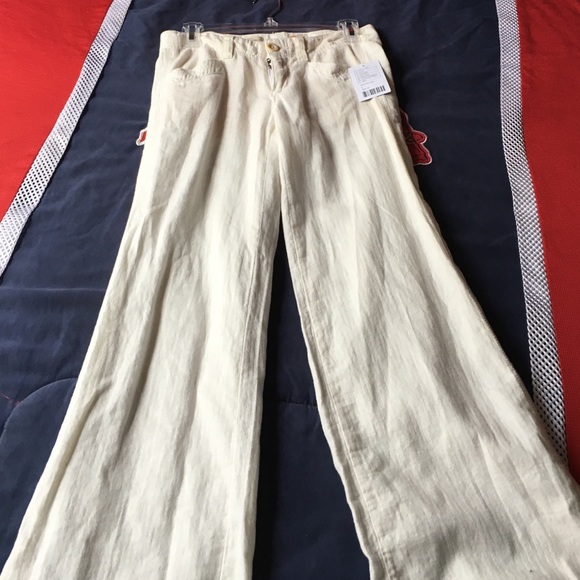 Anthropologie white flare pants