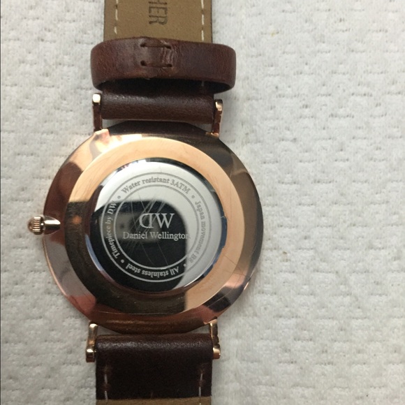 Woman\'s gold rose Daniel Wellington watch