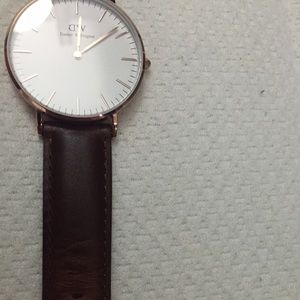 Woman's gold rose Daniel Wellington watch